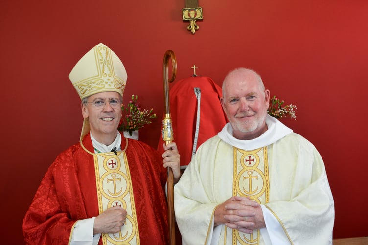 Coming together to celebrate the centenary of St
Peter’s Catholic Church, Bude, are Bishop of Plymouth Nicholas Hudson and Fr John Deeny, parish priest of Launceston, Bude, Callington and the surrounding area