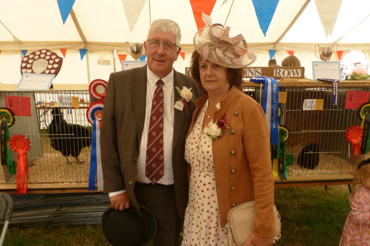 The Launceston Show president for 2026 Martin Stanbury and his wife Vanessa pictured taking a tour of some of the wining exhibits in the poultry section