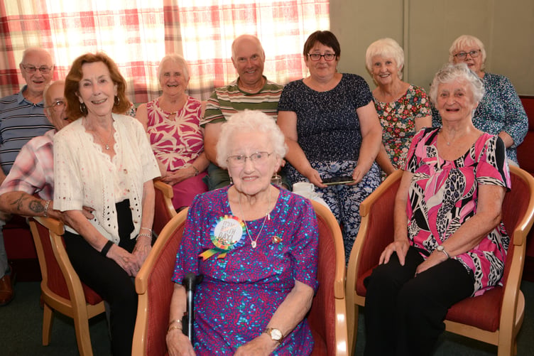 Myrtle Harris (front, centre) enjoying a party held to celebrate her 100th birthday (Picture: Rodney Parrish)