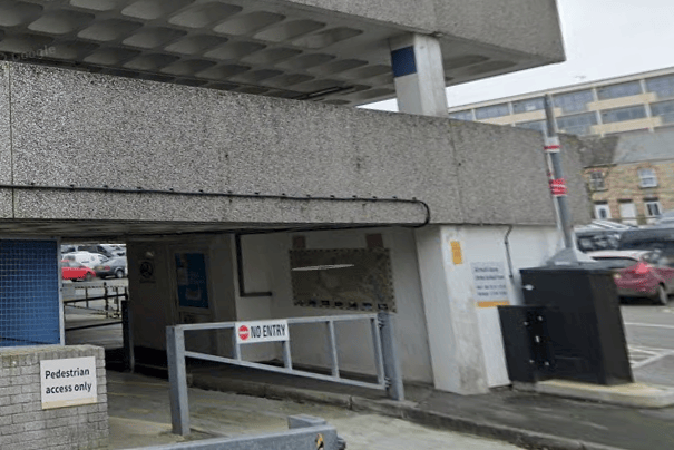 A cordon remains in place around the closed ground floor of the car park