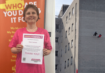 aKate conquers Derriford with charity abseil challenge