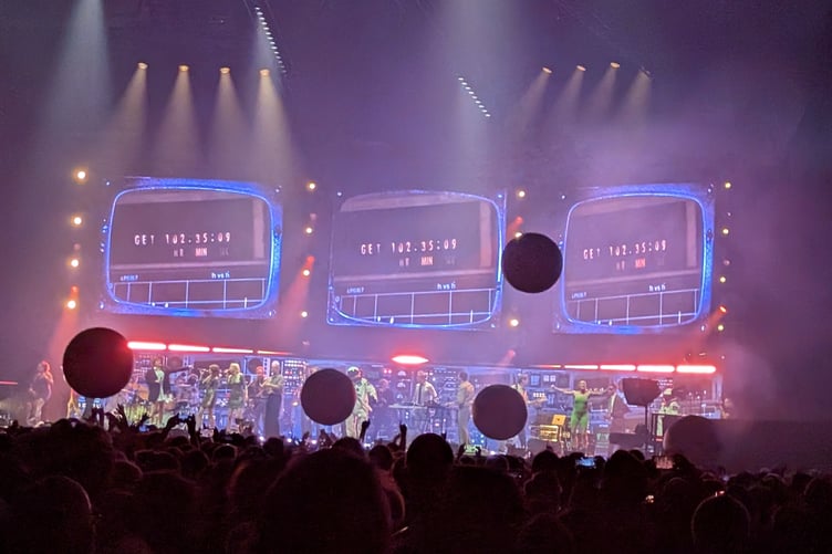 The crowd at PSB's performance cheer and bounce large moons through the air as all those involved end the night with an ensemble (Picture: Aaron Greenaway)