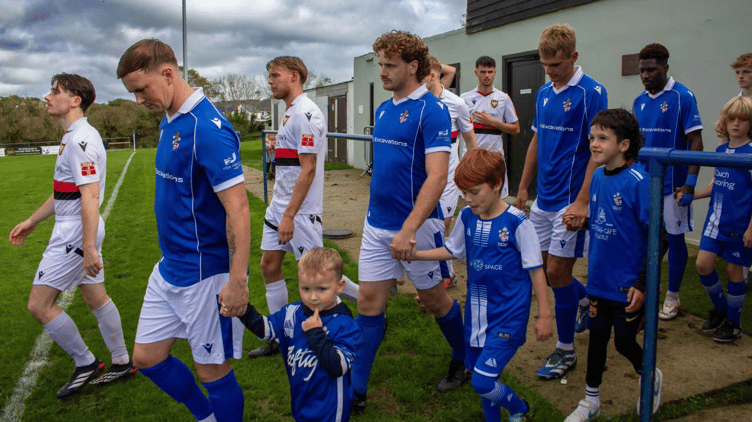 Striker Ray Spear (left in blue) has four goals in six games since arriving at Broadclose Park, while Tega Olaosebikan (fourth from left) has recently netted against Hayle and Helston Athletic.